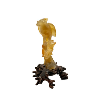 פסל סיני מגולף של ציפור מאגת